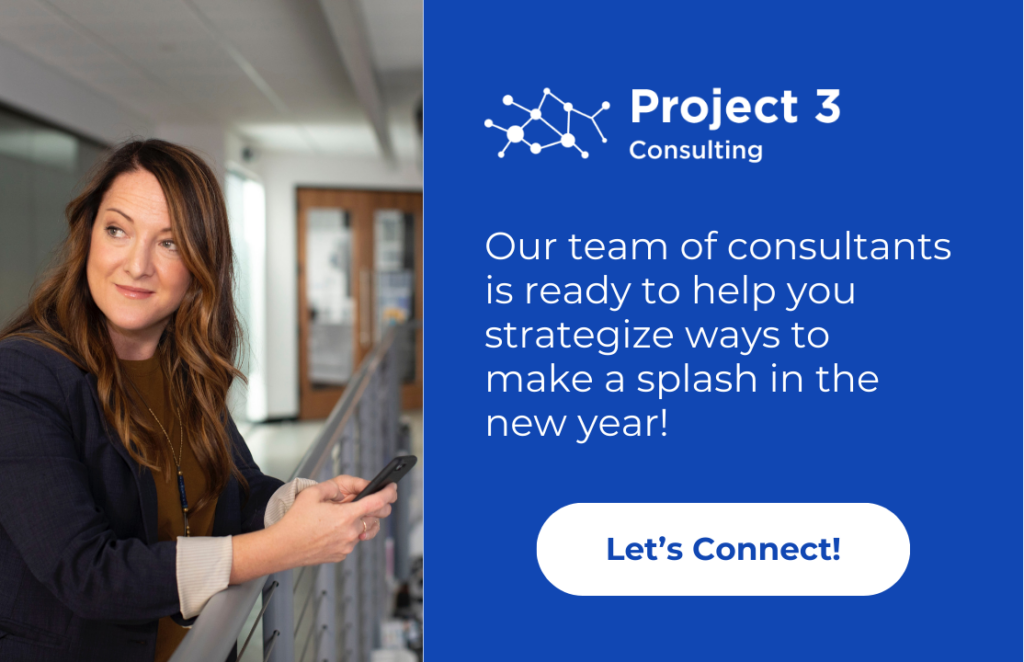 Image of a consultant looking over from her phone to listen to ways she can help a digital marketing team elevate their strategies in the coming year, with text on the right including a call to action to contact Project 3 Consulting to make a splash in the new year.