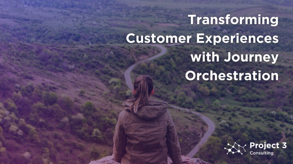 A woman stand on a boulder overlooking a windy road with the title Transforming Customer Experiences with Journey Orchestration