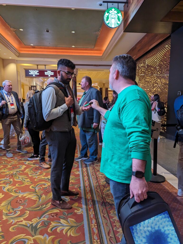 Dave chatting with another MarTech aficionado at Adobe Summit 2024 